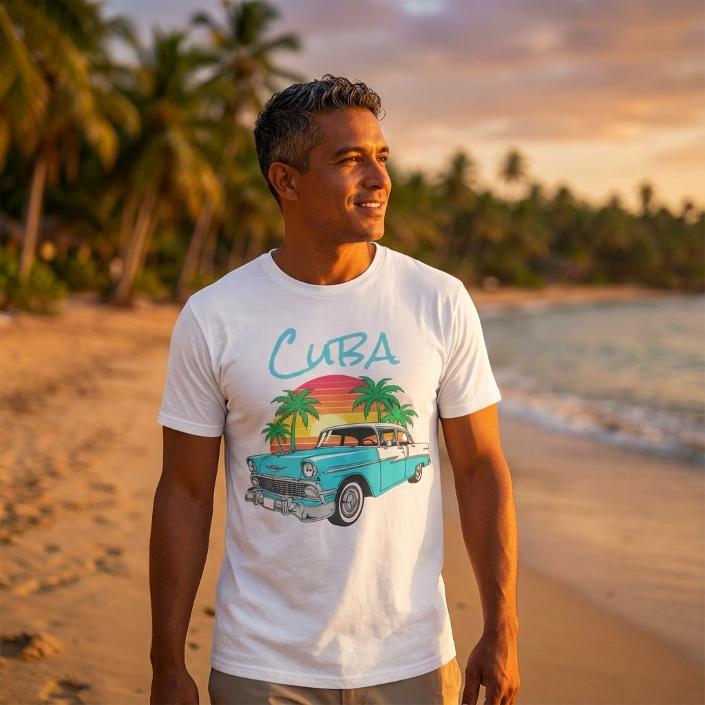 Man wearing a 'Cuba' t-shirt with a vintage car design on a beach at sunset.
