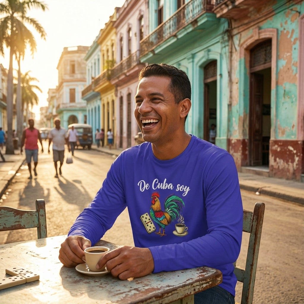 Man in a blue shirt with a colorful rooster design sitting at an outdoor table in a vibrant street scene.
