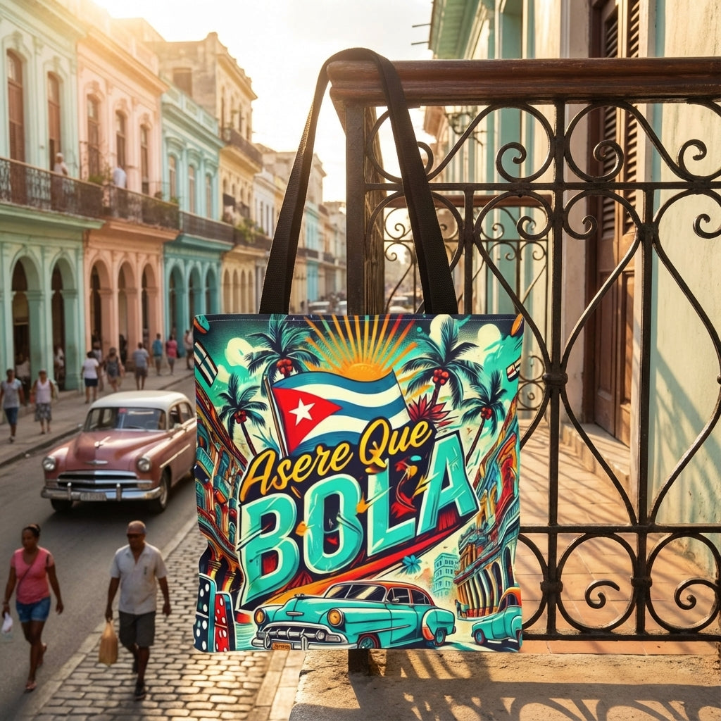 Tote bag with colorful design featuring text and vintage cars, placed on a balcony railing with a street scene in the background.