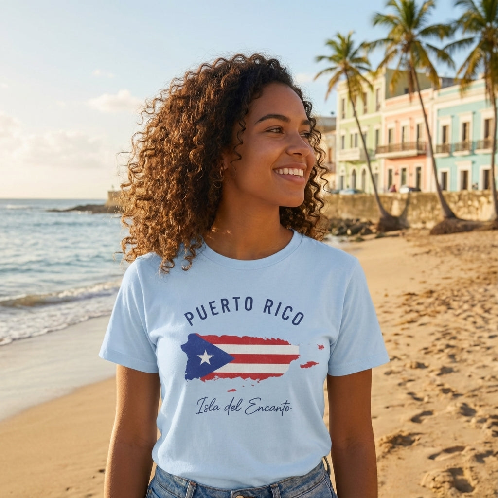 Woman wearing a light blue t-shirt with Puerto Rico design on a beach.