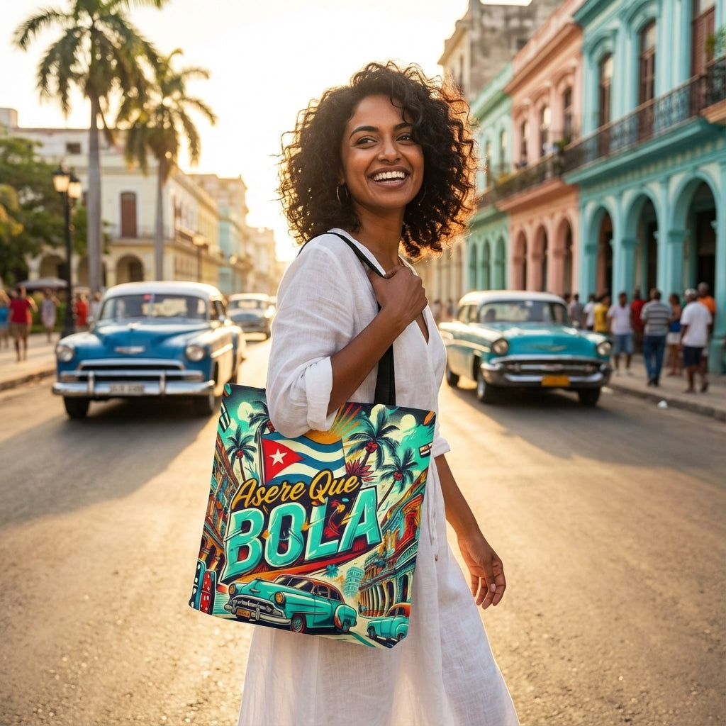 Woman holding a colorful tote bag with Cuban-themed design on a street in Cuba.