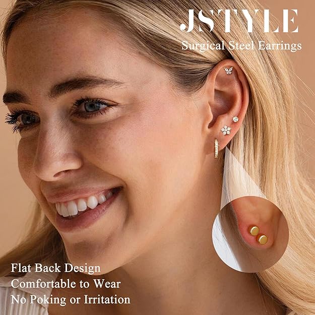 Woman wearing JSTYLE surgical steel earrings with a focus on comfort and design.