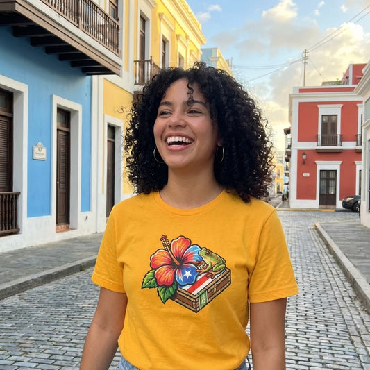 Woman wearing a yellow t-shirt with a colorful graphic in an urban setting
