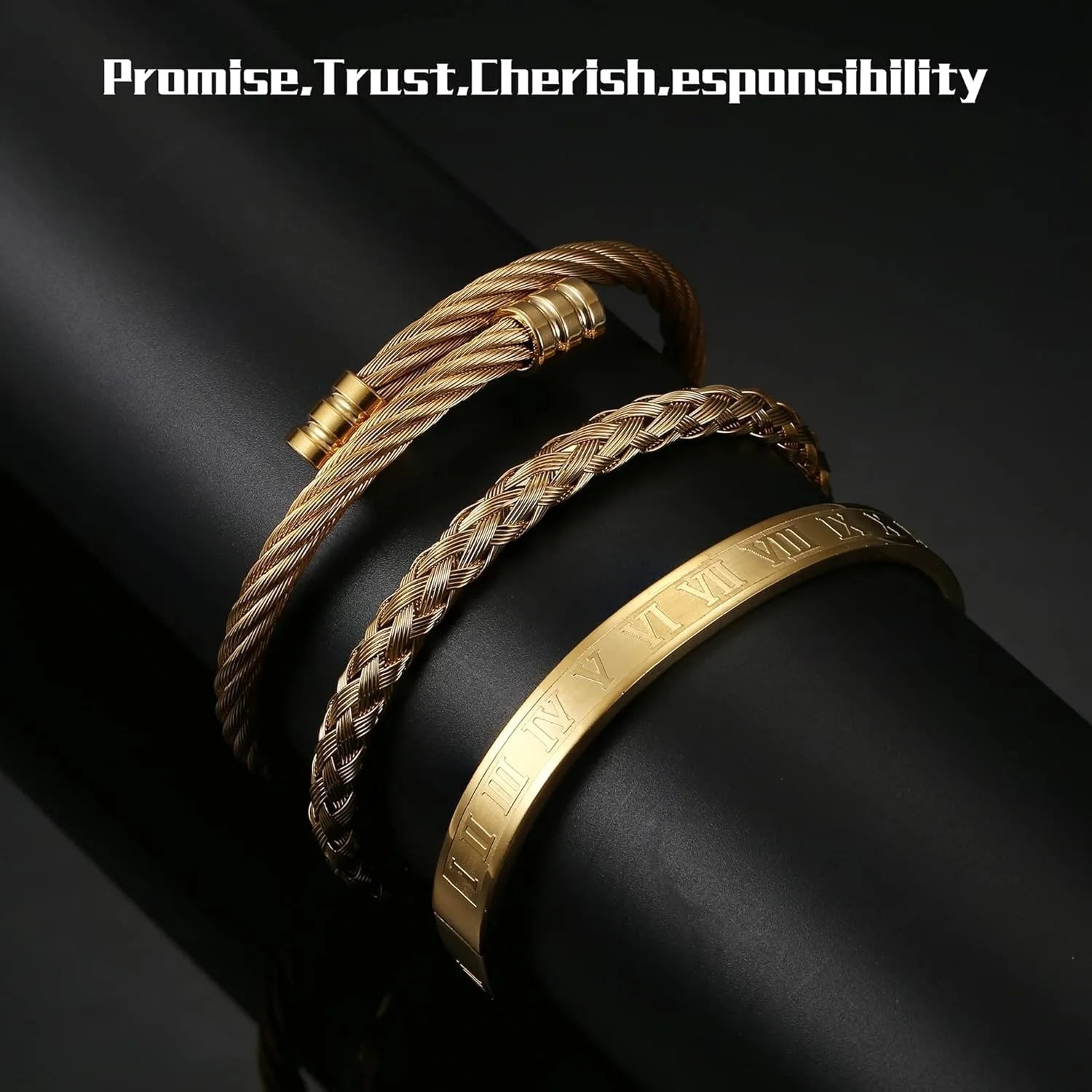 Three gold bracelets on a dark surface with text 'Promise, Trust, Cherish, Responsibility' above.