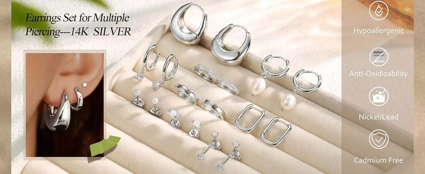 Set of silver earrings displayed on a beige surface with an inset showing an ear wearing one of the earrings.