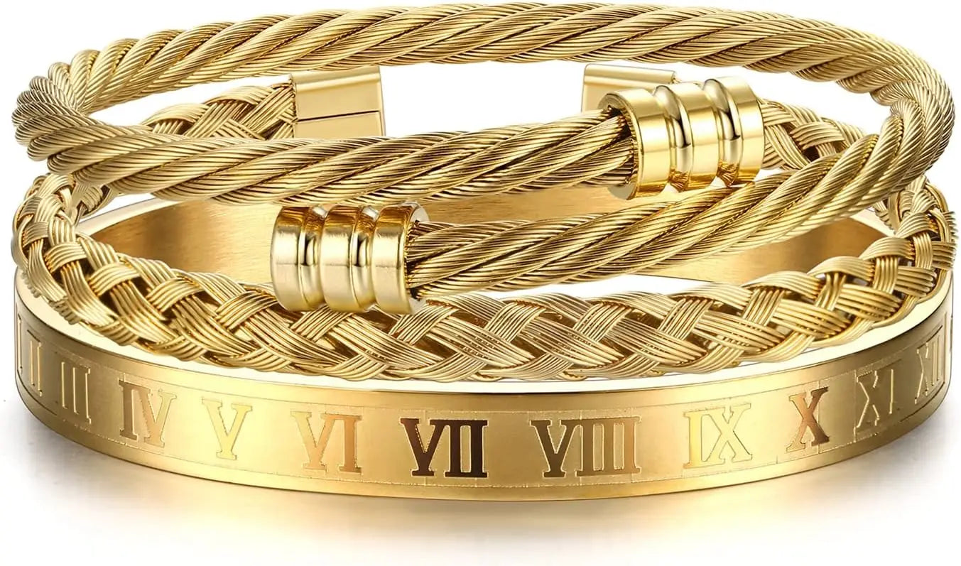 Gold braided bracelet with Roman numeral engraving on a white background