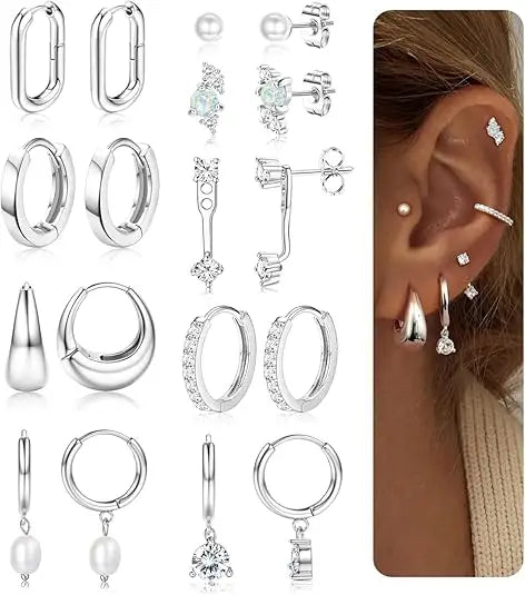 Collection of silver earrings displayed with a close-up of an ear wearing multiple pairs.