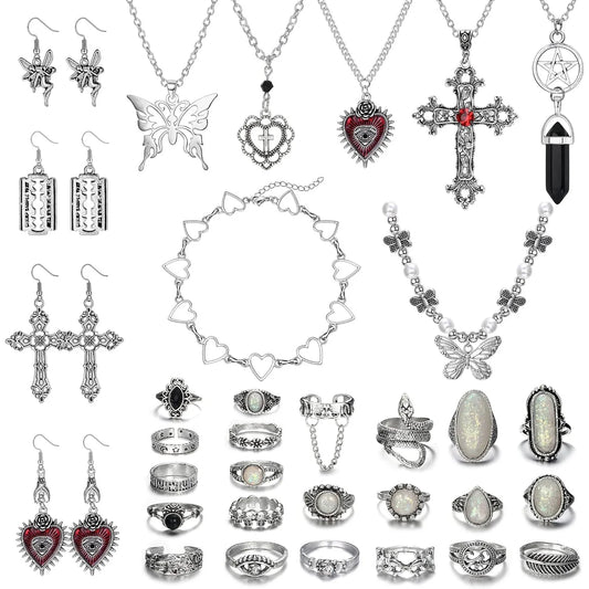 Collection of various silver jewelry items including necklaces, earrings, and rings on a white background.